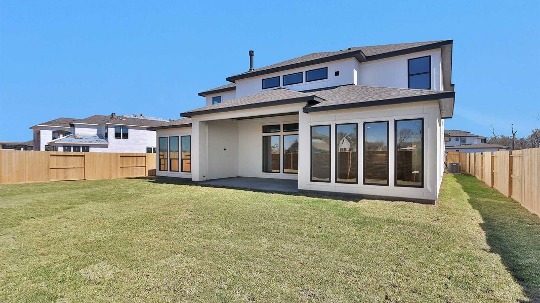Exterior details and patio area of a home in Sienna, Missouri City (Image 3).