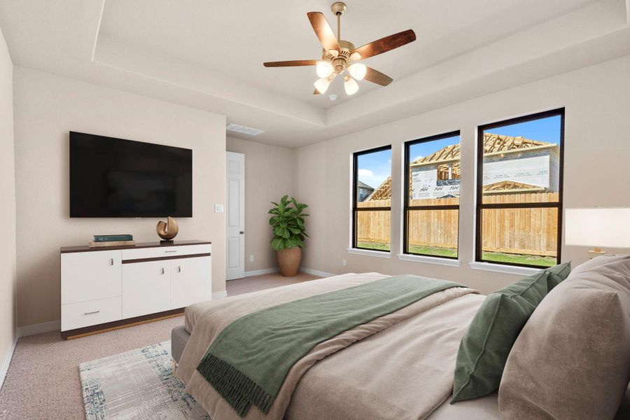 The primary bedroom is generously sized, creating a tranquil and spacious retreat that offers ample room for relaxation. Featuring plush carpet, high ceilings, fresh paint, and large windows that lets in natural lighting throughout the day. The primary bedroom is generously sized, creating a tranquil and spacious retreat that offers ample room for relaxation. Featuring plush carpet, high ceilings, fresh paint, and large windows that lets in natural lighting throughout the day.