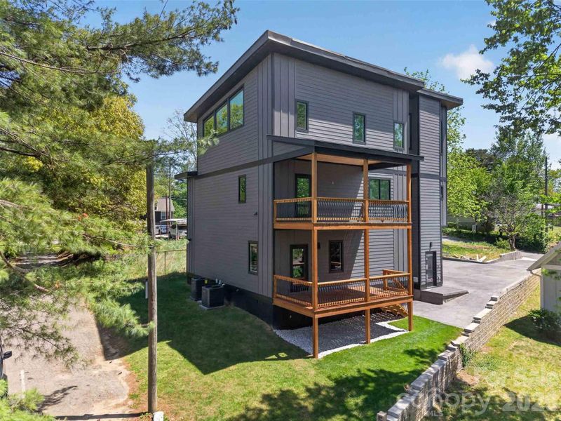 Exterior details and patio area of a home in , Asheville (Image 26).
