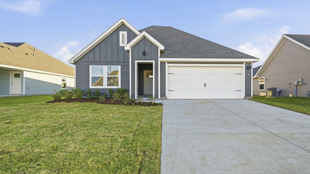Front exterior of a new home in Windrose, Pilot Point, TX, highlighting curb appeal (Image 1).