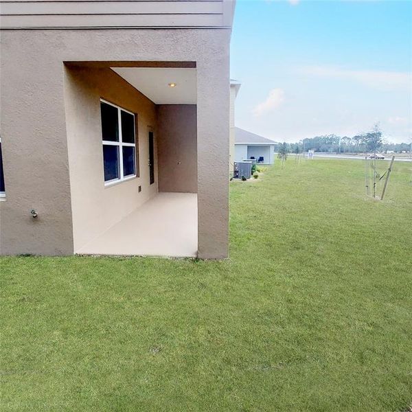 Exterior details and patio area of a home in , Harmony (Image 2).