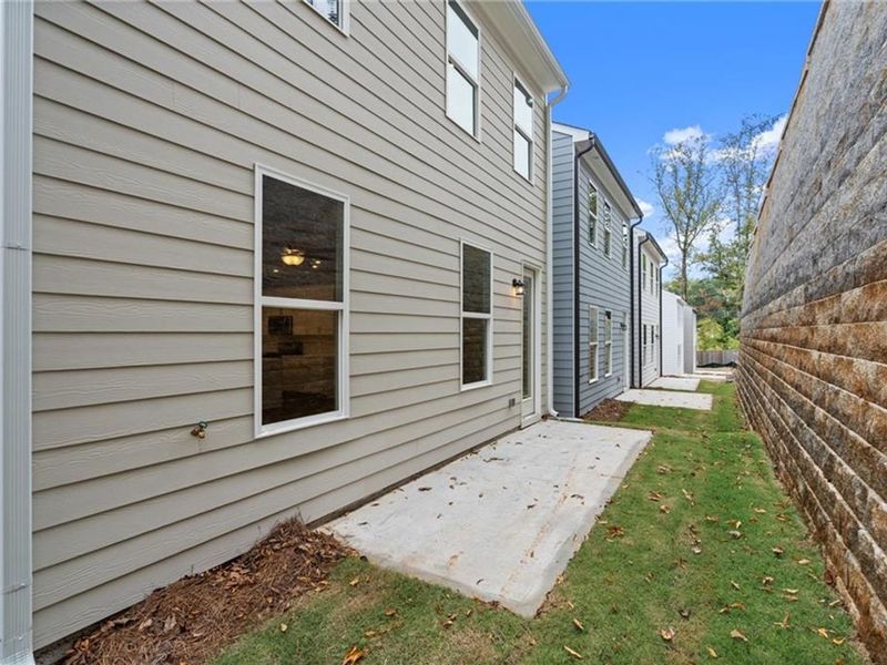 Exterior details and patio area of a home in The Village at Shallowford, Kennesaw (Image 4).