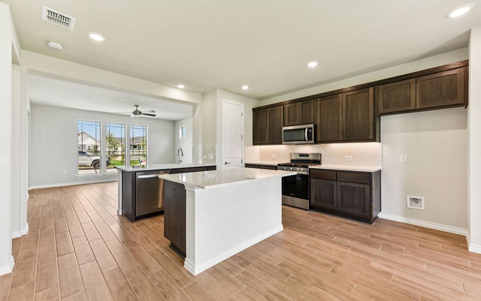 Furnished interior view inside a new home in Kissing Tree, San Marcos (Image 6).
