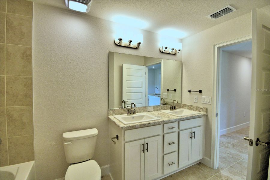 Furnished interior view inside a new home in Cadence Crossing, Auburndale (Image 12). Furnished interior view inside a new home in Cadence Crossing, Auburndale (Image 12).