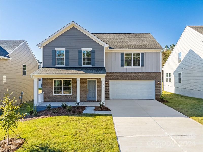 Hardie Plank Exterior w/ Brick Accents