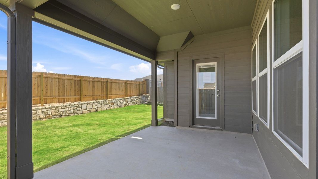 Exterior details and patio area of a home in Hunters Glen, Jarrell (Image 3). Exterior details and patio area of a home in Hunters Glen, Jarrell (Image 3).
