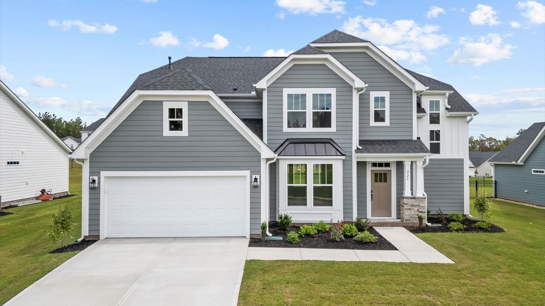 Representative exterior photo of a completed home built from the Arlington by DRB Homes in Kayfield at Midway, Anderson, SC (Image 22). Representative exterior photo of a completed home built from the Arlington by DRB Homes in Kayfield at Midway, Anderson, SC (Image 22).