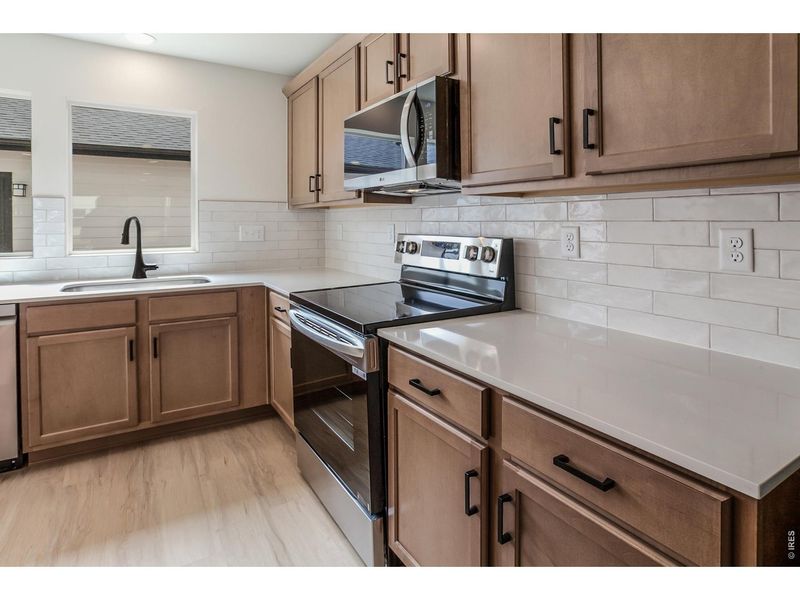 Furnished interior view inside a new home in Prairie Song Story Collection - Single Family Homes, Windsor (Image 6).