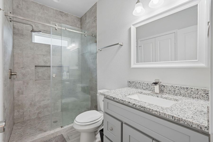 Furnished interior view inside a new home in Arrowhead Lakes, Willis (Image 29).