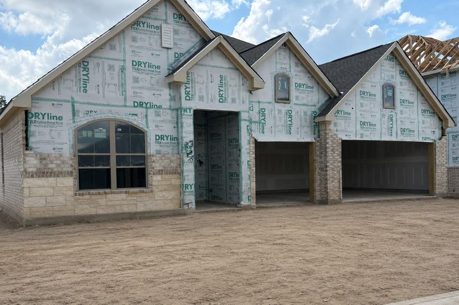 In-progress construction of a new home in The Meadows at Imperial Oaks, Spring, TX (Image 5).