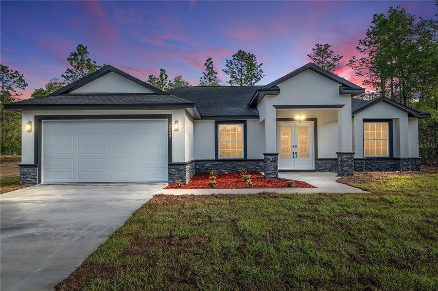 Front exterior of a new home in , Dunnellon, FL, highlighting curb appeal (Image 27).