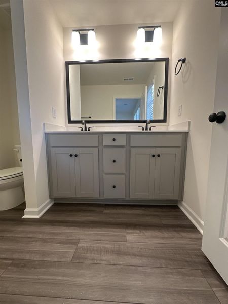 Furnished interior view inside a new home in Piney Woods Bluff, Columbia (Image 6).