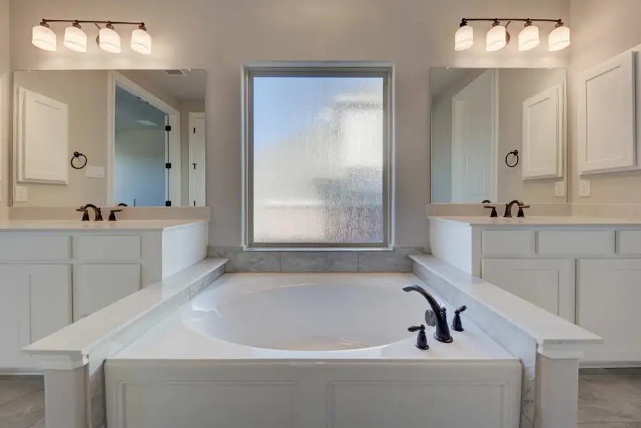 Representative furnished interior of a home built from the Barnett by Ashton Woods in Sunday Creek at Kinder Ranch, San Antonio (Image 9).