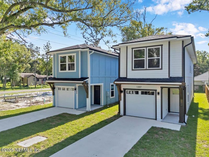 Front exterior of a new home in , Jacksonville, FL, highlighting curb appeal (Image 22).