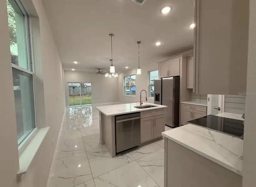 Furnished interior view inside a new home in , Kissimmee (Image 7).