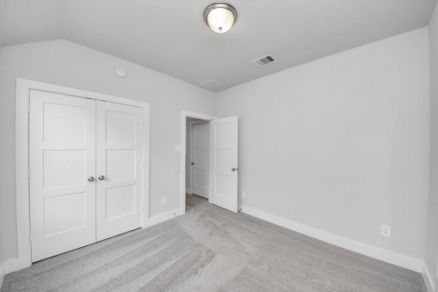 Spacious, unfurnished interior of a new home in Amira: Premier Collection, Tomball (Image 27).