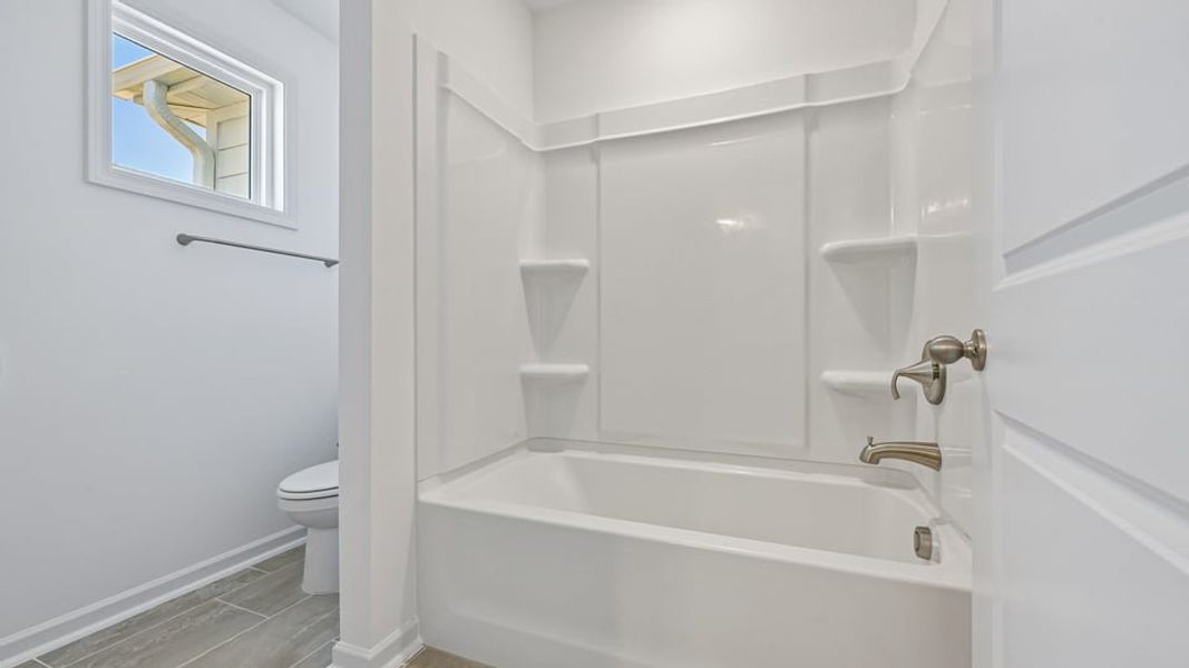 Furnished interior view inside a new home in Eagle Creek, Fuquay Varina (Image 11).