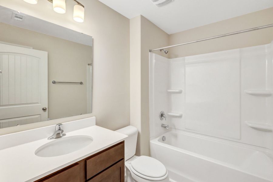 Representative furnished interior of a home built from the The Dublin by Smith Family Homes in Settlers Hammock, Kingsland (Image 32).