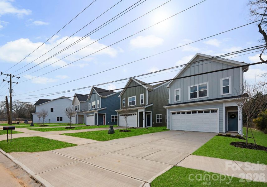 Front exterior of a new home in , Charlotte, NC, highlighting curb appeal (Image 26).