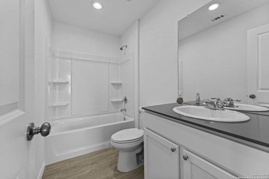 Furnished interior view inside a new home in , New Braunfels (Image 11).