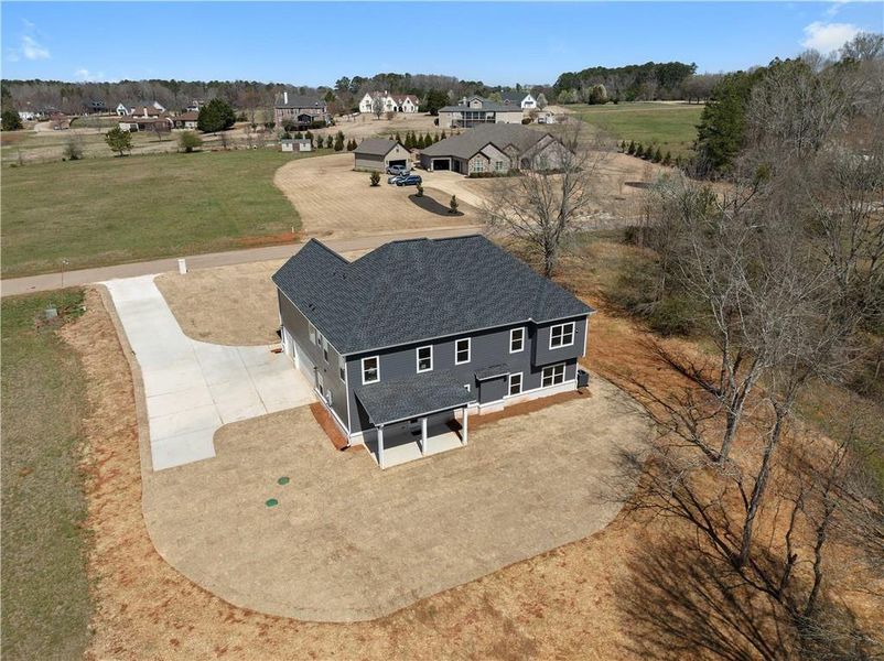 Front exterior of a new home in , Social Circle, GA, highlighting curb appeal (Image 25).
