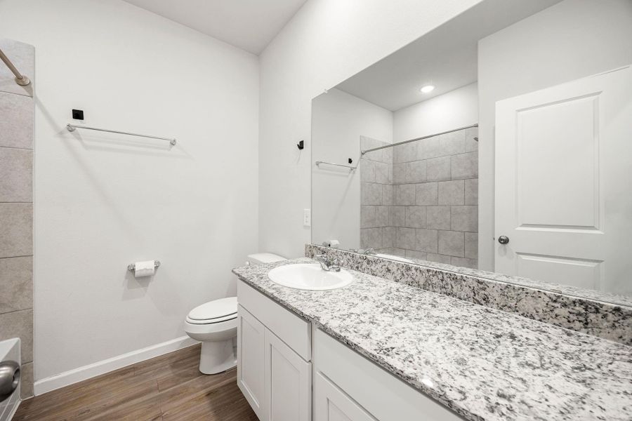 Furnished interior view inside a new home in Granger Pines, Conroe (Image 9).
