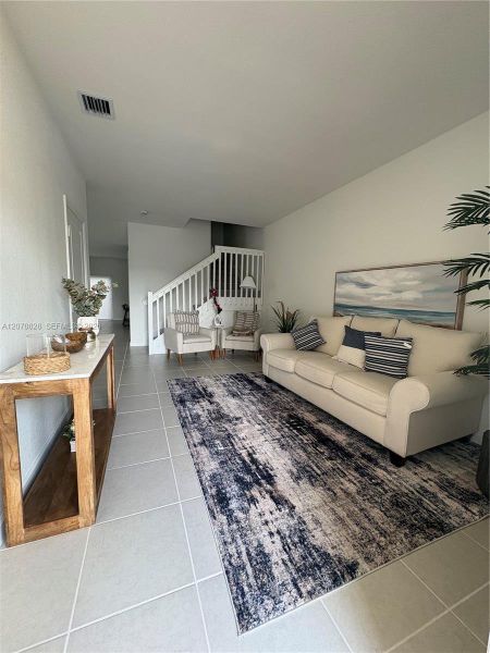 Furnished interior view inside a new home in , Homestead (Image 3). Furnished interior view inside a new home in , Homestead (Image 3).