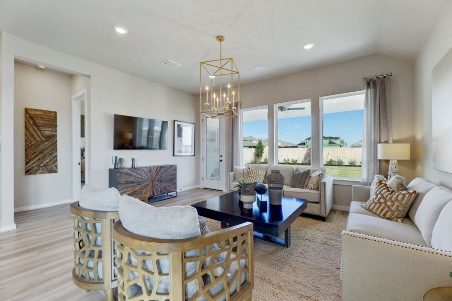 Representative furnished interior of a home built from the Lanport by Scott Felder Homes in Flora, Hutto (Image 6).