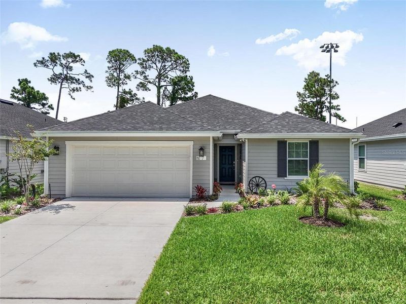 Front exterior of a new home in , Flagler Beach, FL, highlighting curb appeal (Image 25). Front exterior of a new home in , Flagler Beach, FL, highlighting curb appeal (Image 25).
