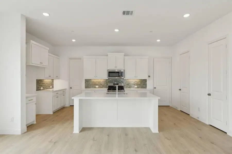 Furnished interior view inside a new home in , Frisco (Image 4).