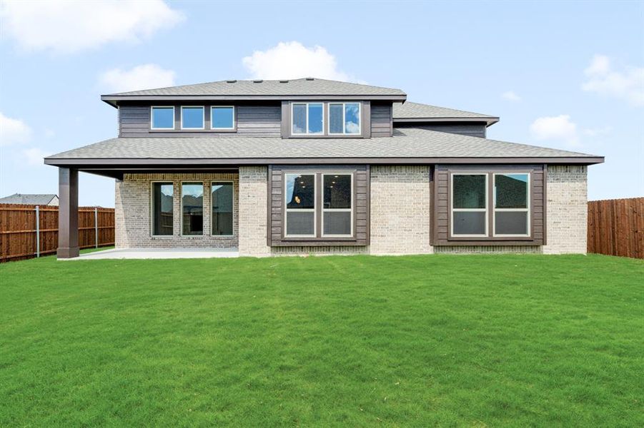 Front exterior of a new home in The Oaks, Red Oak, TX, highlighting curb appeal (Image 26). Front exterior of a new home in The Oaks, Red Oak, TX, highlighting curb appeal (Image 26).