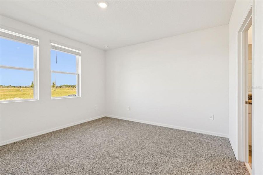 Spacious, unfurnished interior of a new home in Springs at Lake Alfred - Classic Series, Lake Alfred (Image 14).