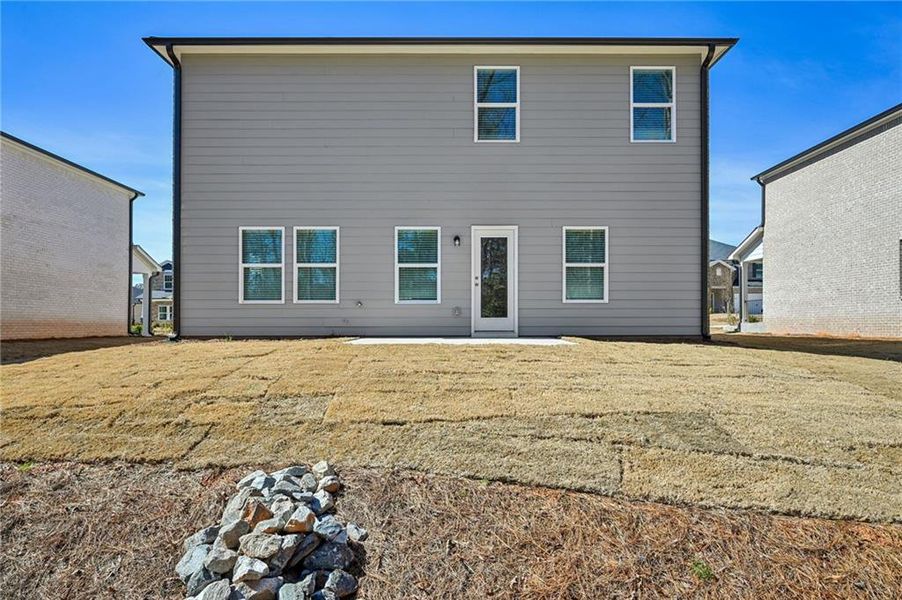 Exterior details and patio area of a home in Creekside at Oxford Park, Fairburn (Image 3).