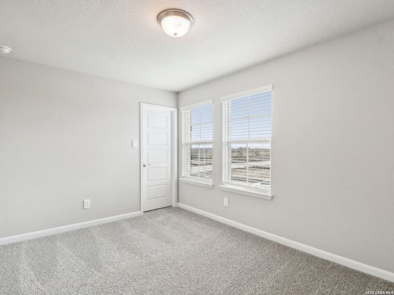 Spacious, unfurnished interior of a new home in Royal Crest, San Antonio (Image 37).