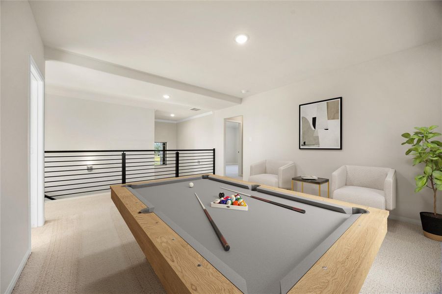 This spacious upstairs Game Room offers a dedicated entertainment hub, overlooking the floor below via a stylish black horizontal metal railing. The room is brightly lit with overhead recessed lighting and features soft, neutral-toned carpeting throughout. *Virtually Staged This spacious upstairs Game Room offers a dedicated entertainment hub, overlooking the floor below via a stylish black horizontal metal railing. The room is brightly lit with overhead recessed lighting and features soft, neutral-toned carpeting throughout. *Virtually Staged