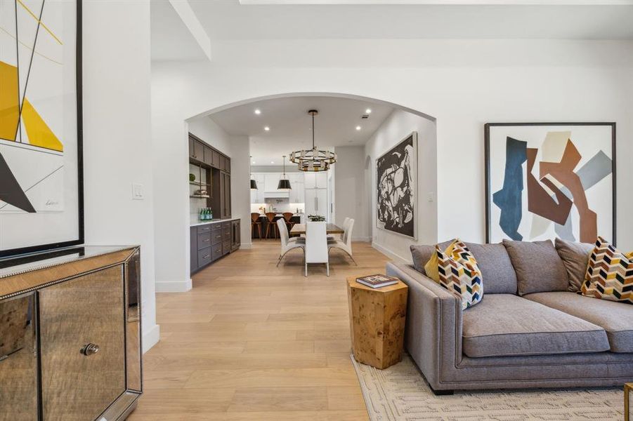 Open concept with defined spaces for living, dining and kitchen. Open concept with defined spaces for living, dining and kitchen.