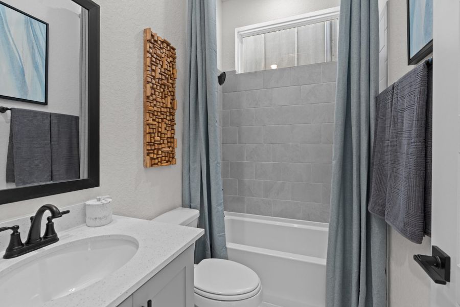 Furnished interior view inside a new home in Centero at Stone Oak, San Antonio (Image 11).