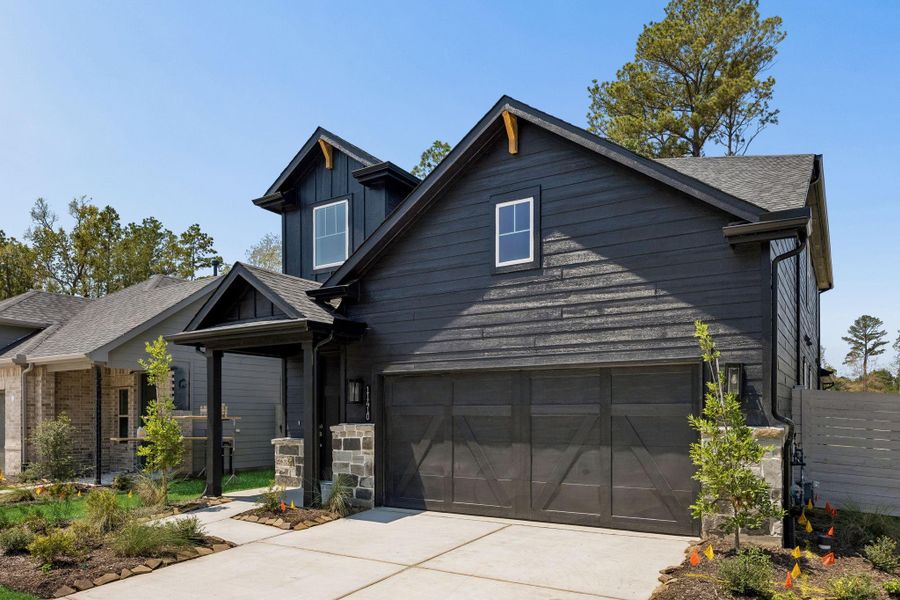 Front exterior of a new home in Pulte Homes at Two Step Farm, Montgomery, TX, highlighting curb appeal (Image 1). Front exterior of a new home in Pulte Homes at Two Step Farm, Montgomery, TX, highlighting curb appeal (Image 1).