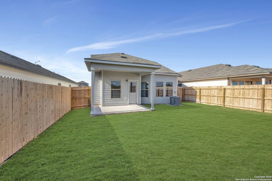 Exterior details and patio area of a home in Park Place, New Braunfels (Image 20).