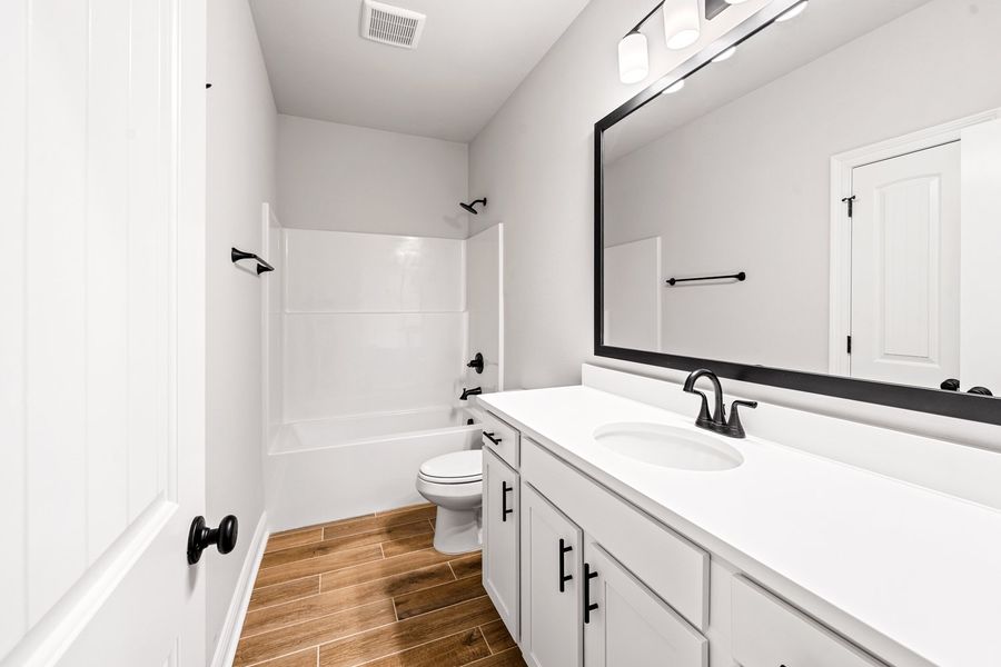 Furnished interior view inside a new home in The Bluffs at Lafayette, Freeport (Image 7).