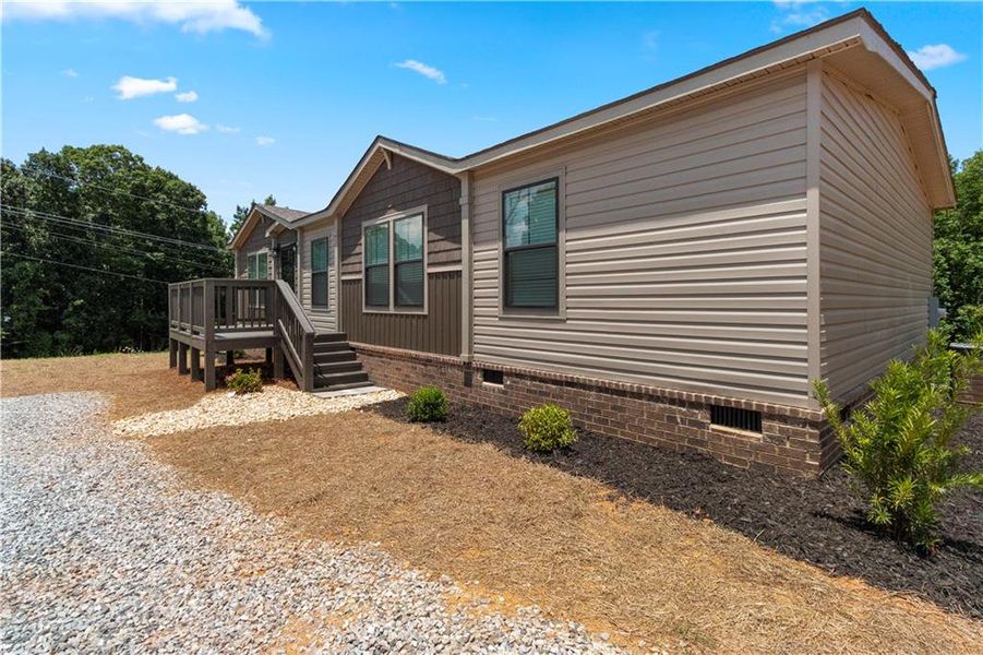 Exterior details and patio area of a home in , Clarkesville (Image 22).