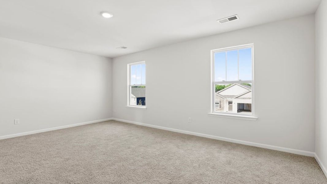 Spacious, unfurnished interior of a new home in Durbin Meadows Traditions, Fountain Inn (Image 31).