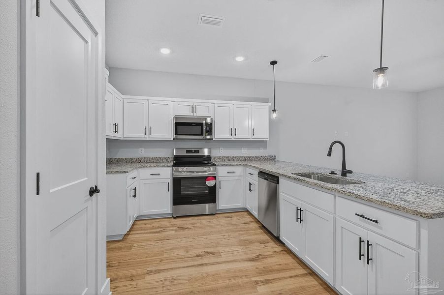 Furnished interior view inside a new home in Cypress Hollow, Pensacola (Image 4).