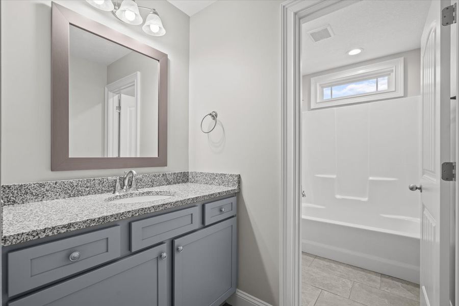 Representative furnished interior of a home built from the Enory by Enchanted Homes in Guadalupe Heights, Seguin (Image 14).