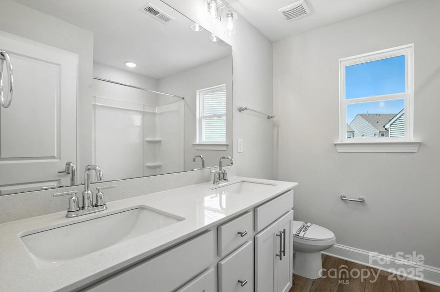 Furnished interior view inside a new home in Hampton Woods, Charlotte (Image 3).