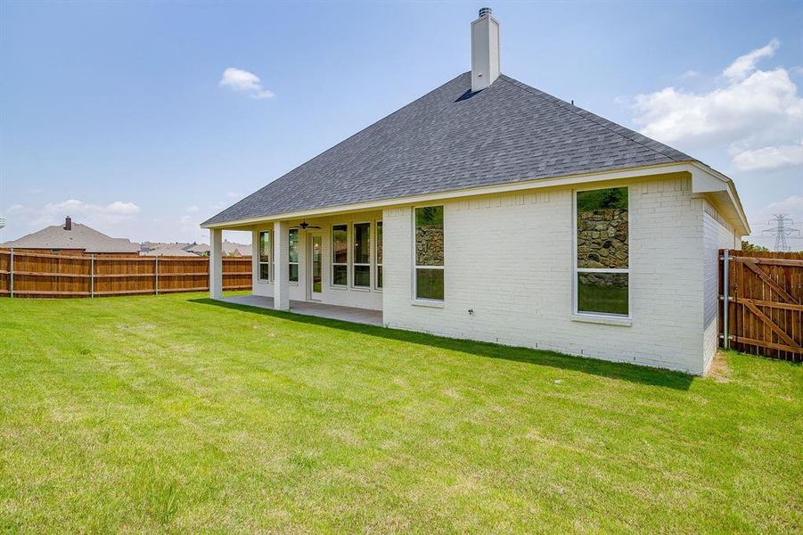 Exterior details and patio area of a home in Whitestone Crest, Benbrook (Image 26).