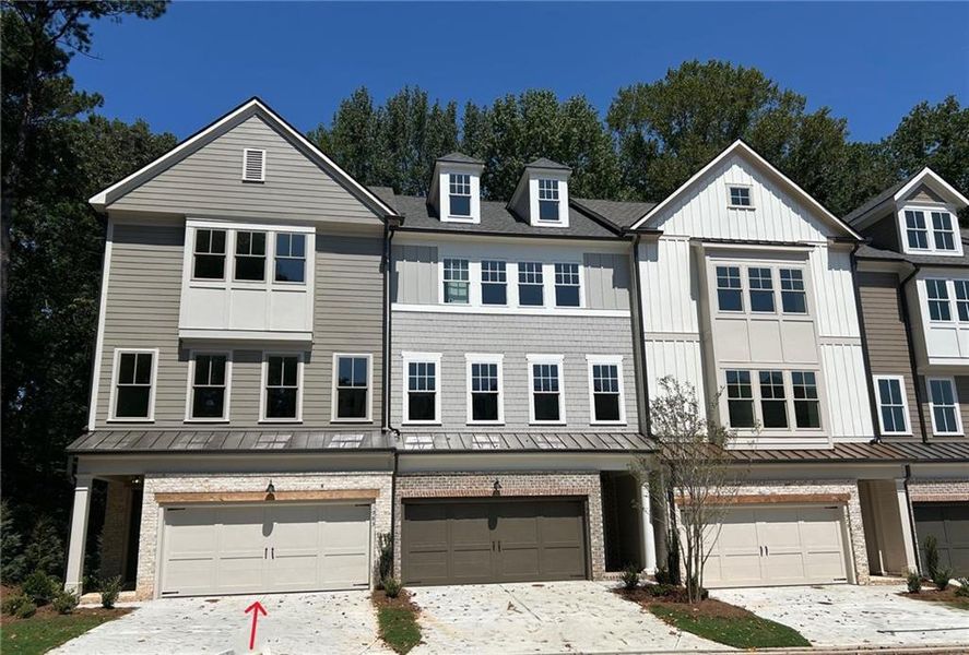 Front exterior of a new home in Devin's Shire - A Kennesaw Tradition, Kennesaw, GA, highlighting curb appeal (Image 24). Front exterior of a new home in Devin's Shire - A Kennesaw Tradition, Kennesaw, GA, highlighting curb appeal (Image 24).