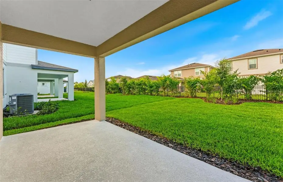 Exterior details and patio area of a home in Waterset, Apollo Beach (Image 2). Exterior details and patio area of a home in Waterset, Apollo Beach (Image 2).