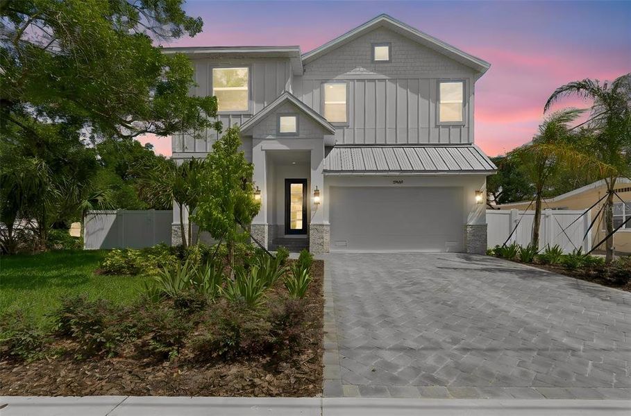 Front exterior of a new home in , Tampa, FL, highlighting curb appeal (Image 32).