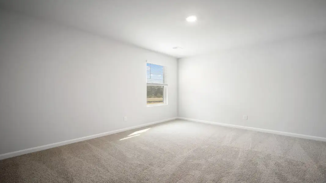 Spacious, unfurnished interior of a new home in The Retreat at East Argent, Ridgeland (Image 23).